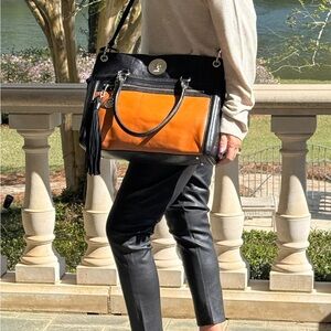 DKNY tan and black large leather bag with leather tassel and silver acce…